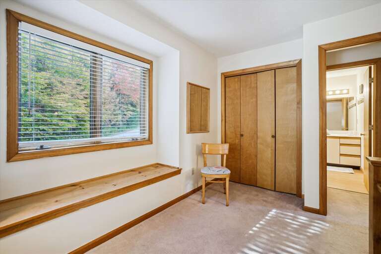 King bedroom with bathroom close by across the hallway.