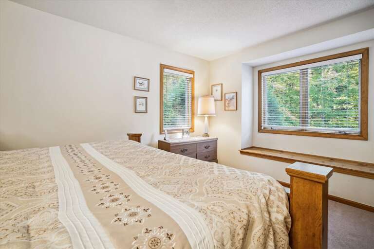 Warm country feel, King bed in the master bedroom.