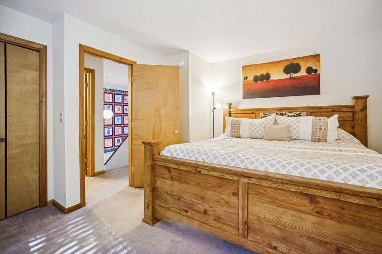 Warm country feel, King bed in the master bedroom.