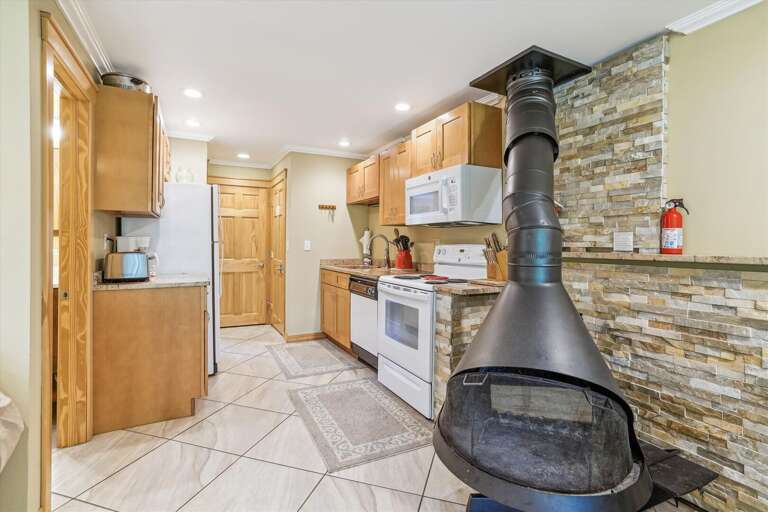 Pot belly wood burning stove, access to the kitchen