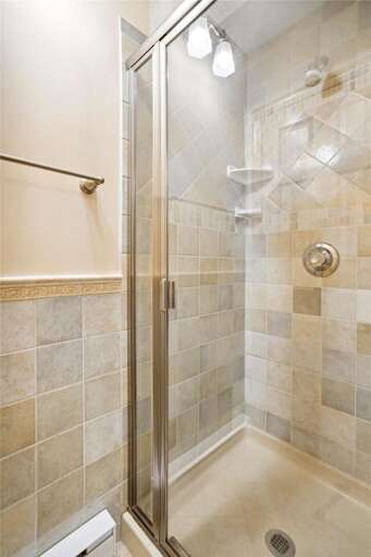 This bathroom is equipped with a shower.