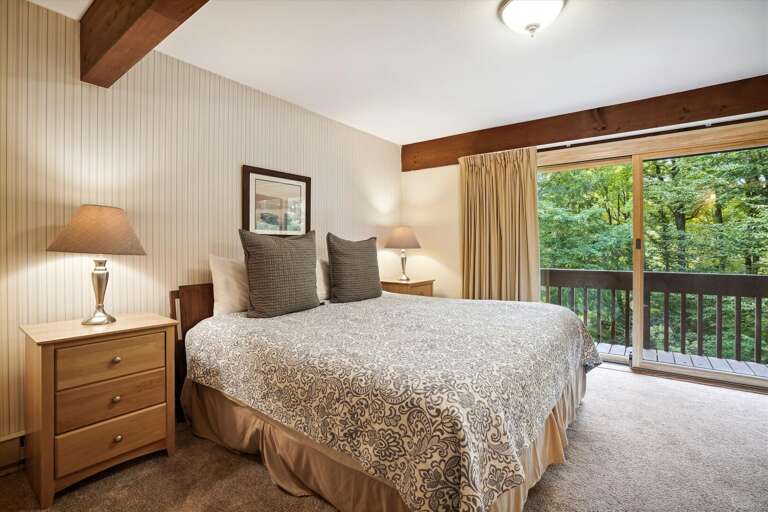 King sized bed! This bedroom has a bathroom too.