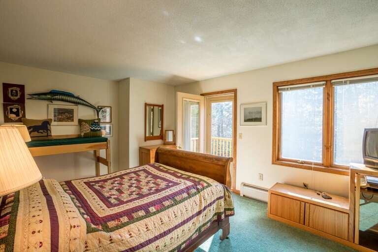 Comfortable bedroom with access to small private deck Comfortable bedroom with access to small private deck