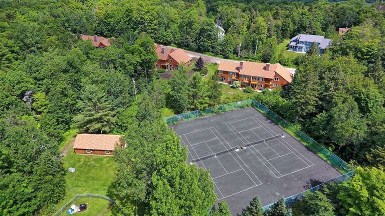 Large tennis court to use during the summer season Large tennis court to use during the summer season