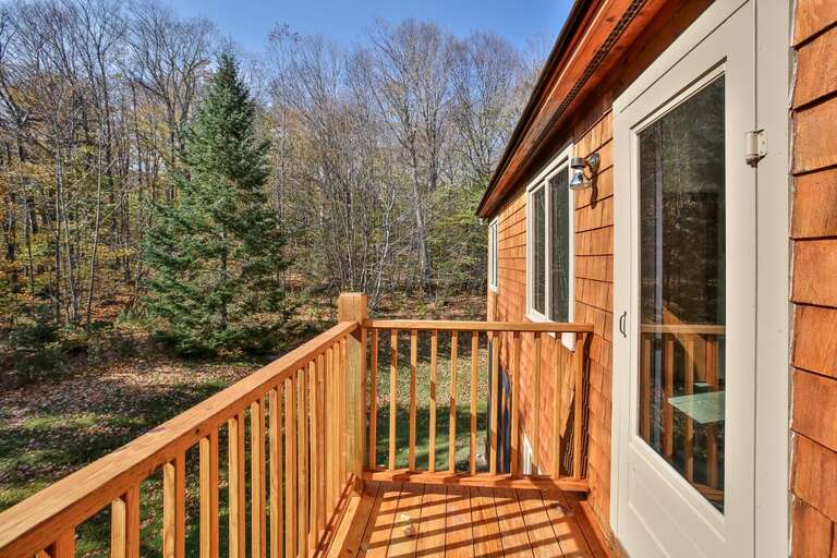 Small private deck out back with beautiful Killington views Small private deck out back with beautiful Killington views