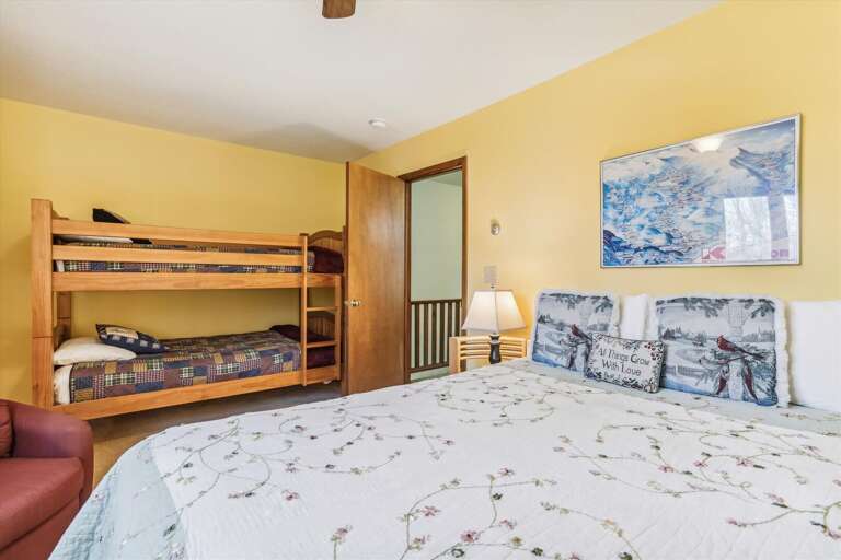 Queen bed and bunk beds