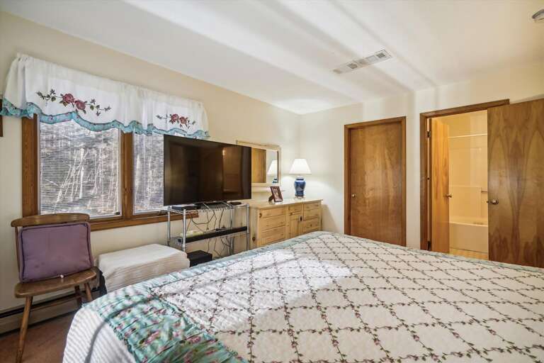 Watch tv while relaxing in bed.