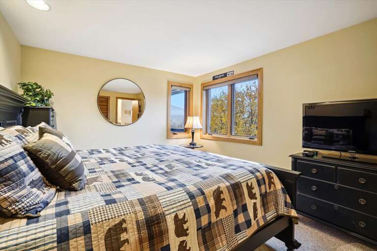 Master bedroom with King size bed and ensuite full bathroom with a jacuzzi tub. Master bedroom with King size bed and ensuite full bathroom with a jacuzzi tub.