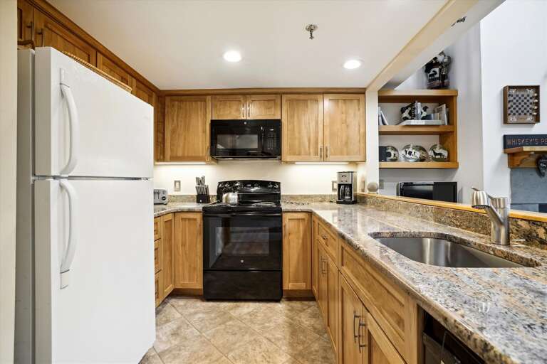 Modern upgraded kitchen.   Lots of counter space, great view to the living room and easy access to dining area while entertaining family and friends Modern upgraded kitchen.   Lots of counter space, great view to the living room and easy access to dining area while entertaining family and friends