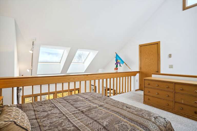 Queen bed in Loft with attached bathroom. Queen bed in Loft with attached bathroom.