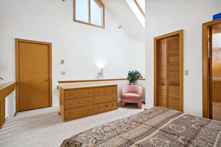 Queen bed in Loft with attached bathroom. Queen bed in Loft with attached bathroom.
