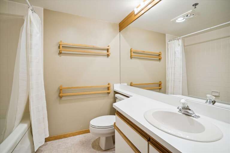 Full bathroom with tub/shower.