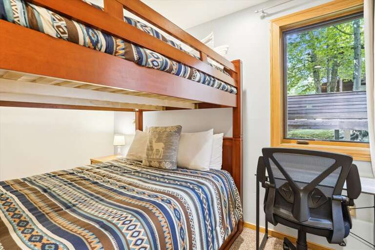 Bunk beds with a queen over a queen.