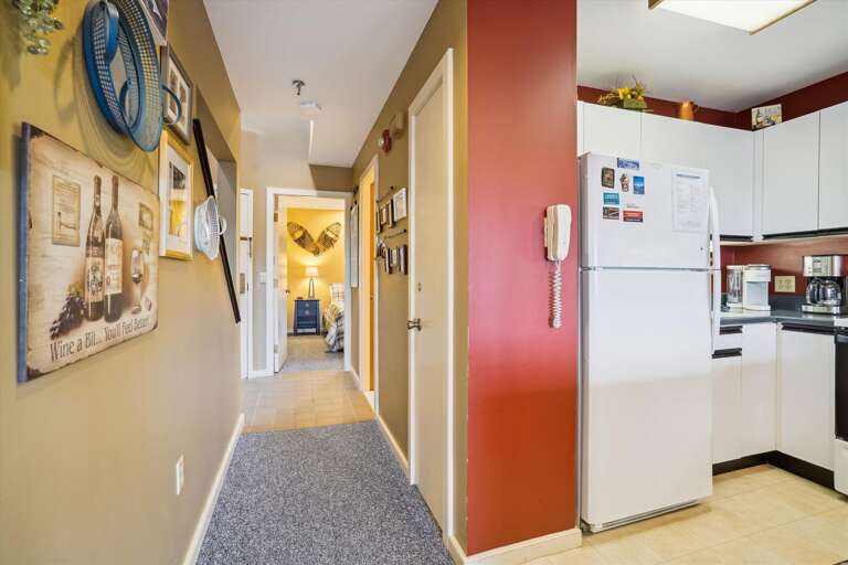 The hallway leads to the bedroom.