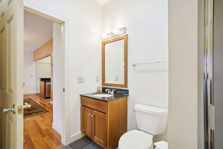 Full bathroom with a stand up shower.