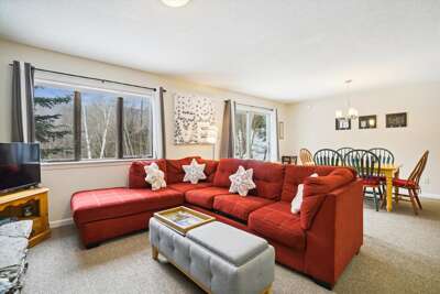 Inviting Living Space with Stone Fireplace