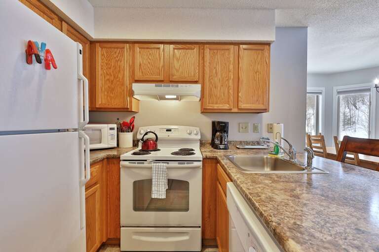 Bright modern Kitchen, open floor plan brings all your social activities together.  Stocked with what you need for home cooked meals and entertaining guests. Bright modern Kitchen, open floor plan brings all your social activities together.  Stocked with what you need for home cooked meals and entertaining guests.