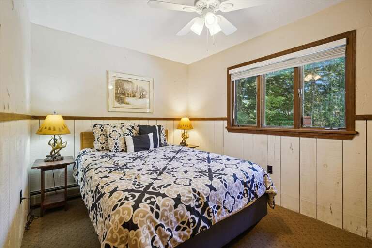 Master bedroom on upper level with queen bed