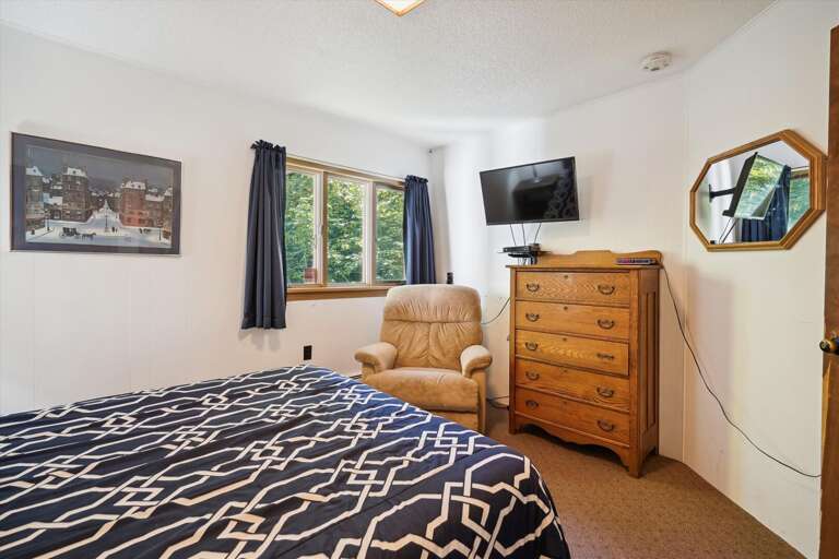 Lay in bed and enjoy the flat screen tv.