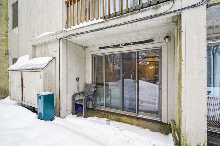 Sliding doors that lead to the outside.