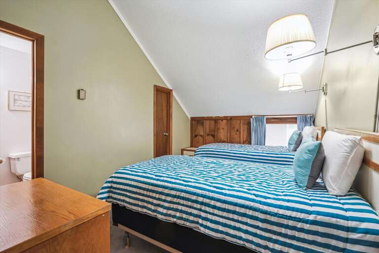 Twin bedroom located on second floor of unit