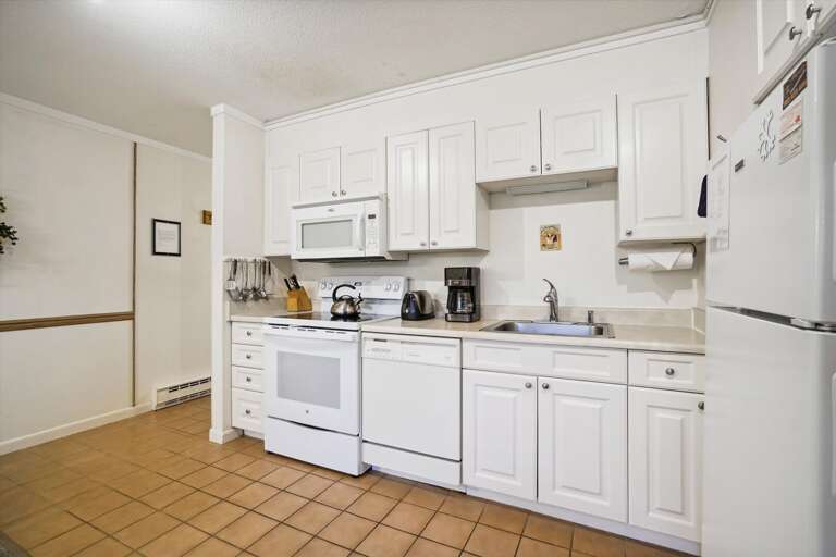 Vibrant kitchen!  Compact and great access to all you need for home cooked meals!