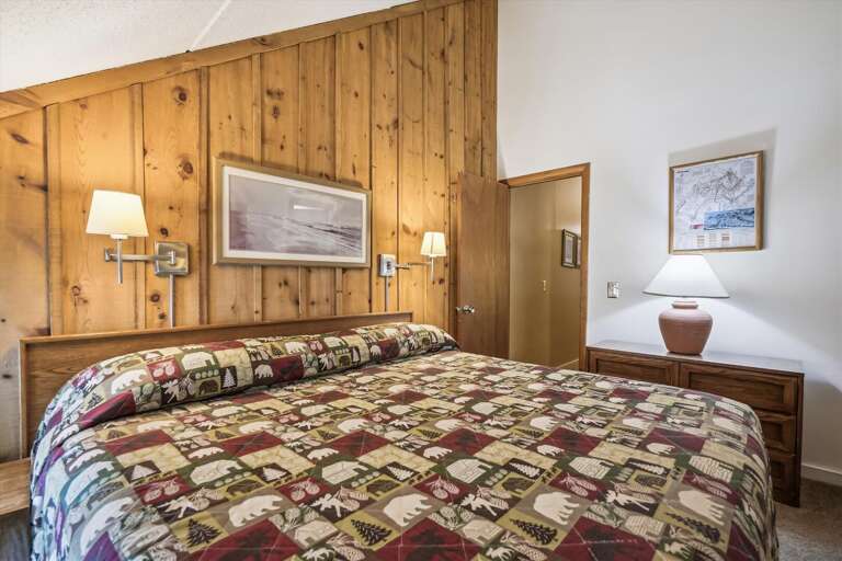 King bed with attached bathroom.