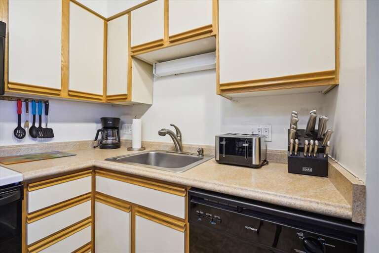 This kitchen has a dishwasher.