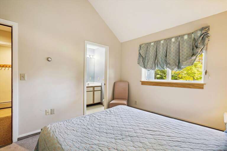 Queen bedroom with a full bathroom.