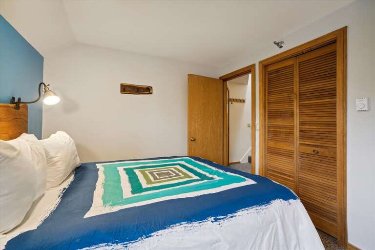 Bedroom with a queen bed on the main level.