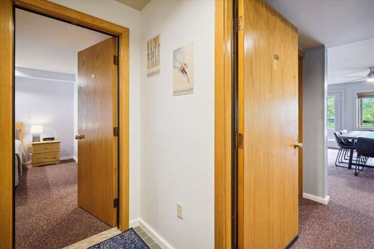 A place to store your boots and entrance to unit and second bedroom.