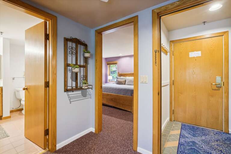 A place to store your boots and entrance to unit and second bedroom.