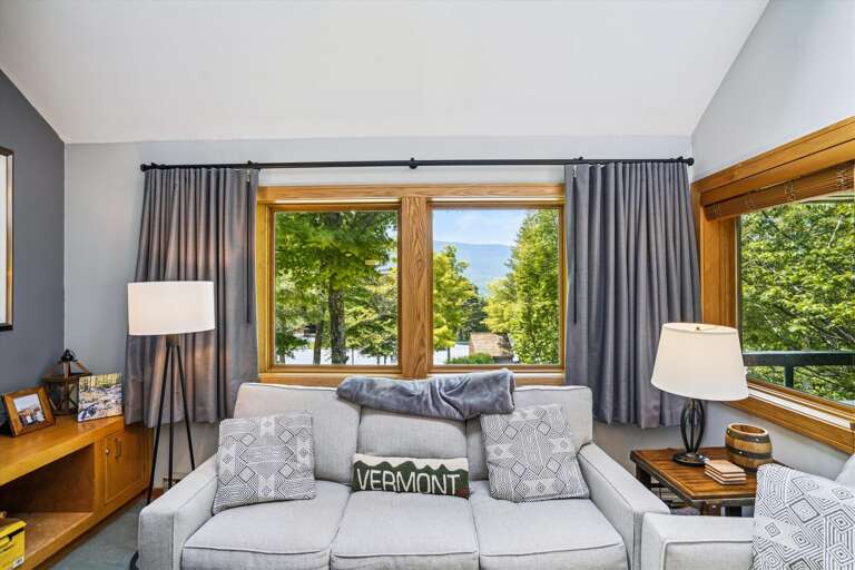 Comfortable seating and large windows framing the scenery from your living room.  Plenty of natural lighting to bring more cheer to the atmosphere. Comfortable seating and large windows framing the scenery from your living room.  Plenty of natural lighting to bring more cheer to the atmosphere.