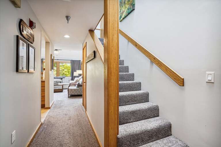 Entrance to your living room and upstairs living spaces Entrance to your living room and upstairs living spaces