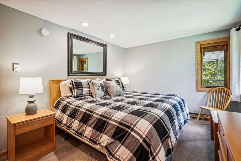 Master bedroom with King bed with attached bathroom.  Lots of natural lighting. Master bedroom with King bed with attached bathroom.  Lots of natural lighting.