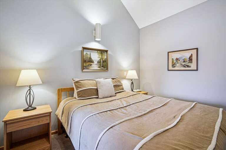 Queen bedroom with attached full bathroom. Tastefully decorated in neutral coloring.  Soft lighting to add to the ambiance of this adorable bedroom. Queen bedroom with attached full bathroom. Tastefully decorated in neutral coloring.  Soft lighting to add to the ambiance of this adorable bedroom.