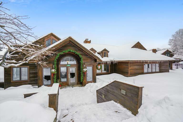 Snow-Lined Entrance Walkway