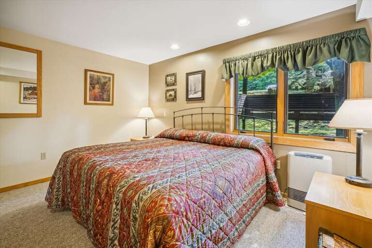 Master bedroom with queen bed
