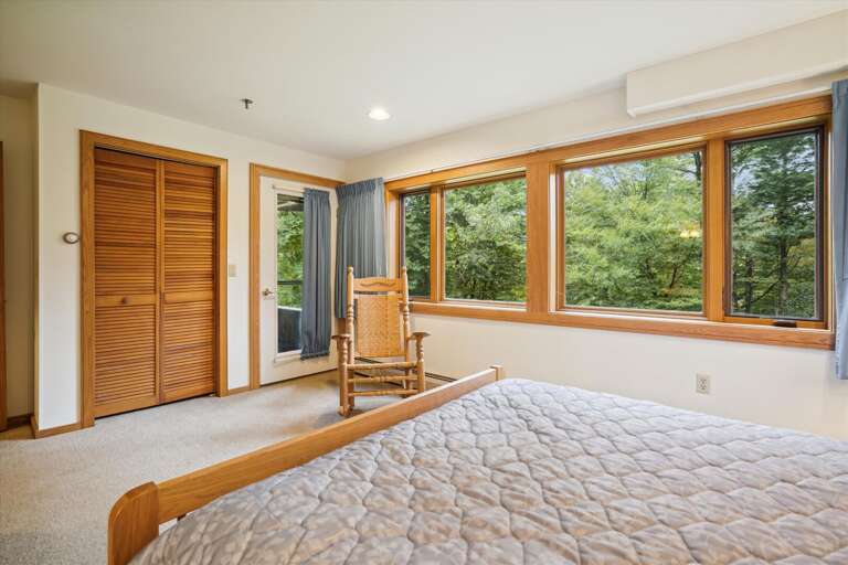 Quaint, spacious queen bedroom.  Large windows to bring in lots of natural light