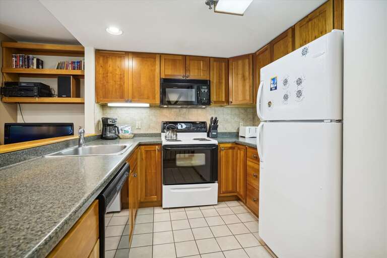 Upgraded kitchen, plenty of counterspace.  Stocked to aid in cooking those home cooked meals