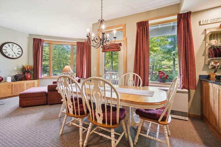 Enjoy the ambiance of the warm colors and beautiful scenery at the dining room table, seats 6 comfortably