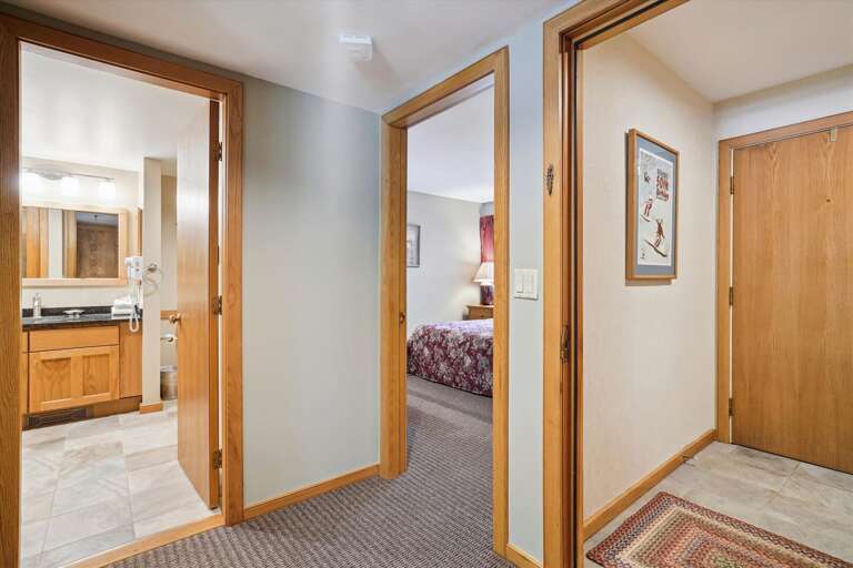 Entrance to small foyer and living spaces