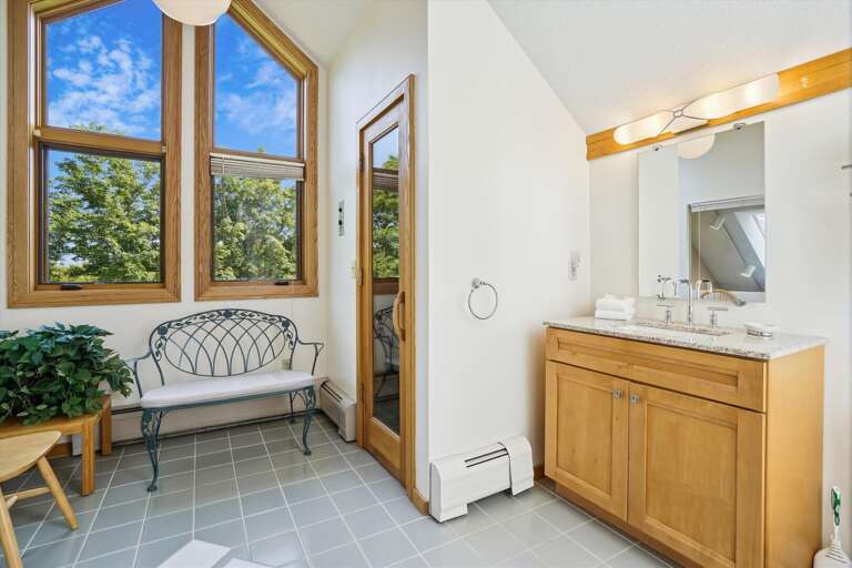 Full bathroom with a sauna