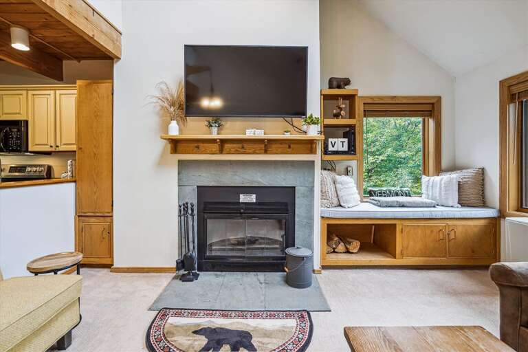 Enhance the ambiance with the wood burning fireplace