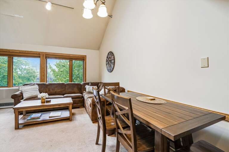 Table seats 6 comfortably.  (4 chairs and a 2 person bench)