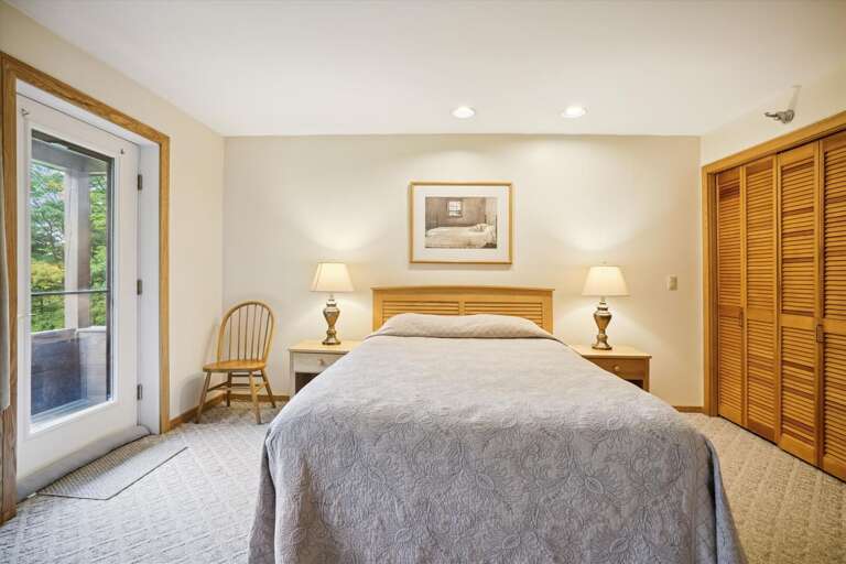 Spacious master bedroom located in lower level of the condo. Attached bathroom and your own Entrance/Exit to deck Spacious master bedroom located in lower level of the condo. Attached bathroom and your own Entrance/Exit to deck