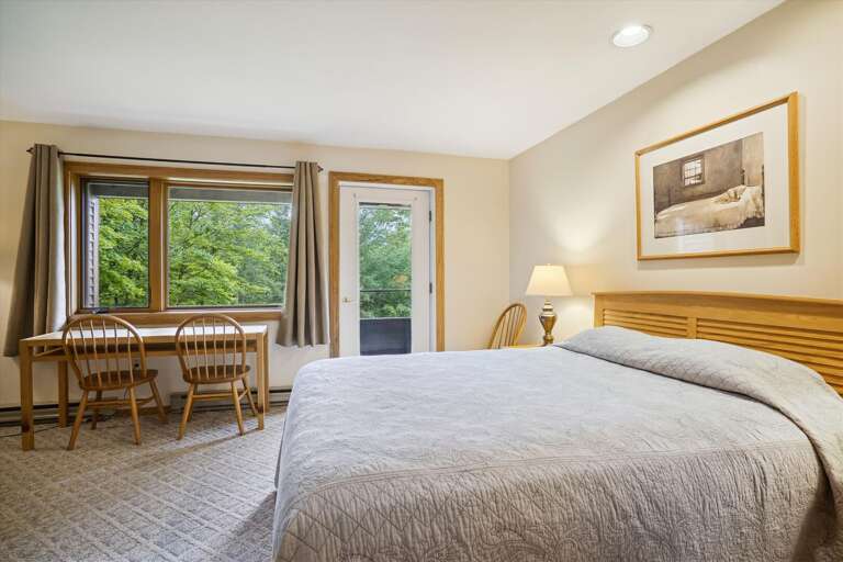 Spacious master bedroom located in lower level of the condo. Attached bathroom and your own Entrance/Exit to deck