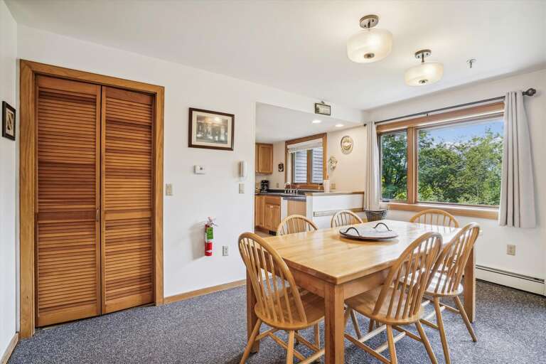 Dining table seats 6 comfortably with 2 extra seats at the smaller table. Dining table seats 6 comfortably with 2 extra seats at the smaller table.