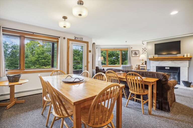 Dining table seats 6 comfortably with 2 extra seats at the smaller table. Dining table seats 6 comfortably with 2 extra seats at the smaller table.