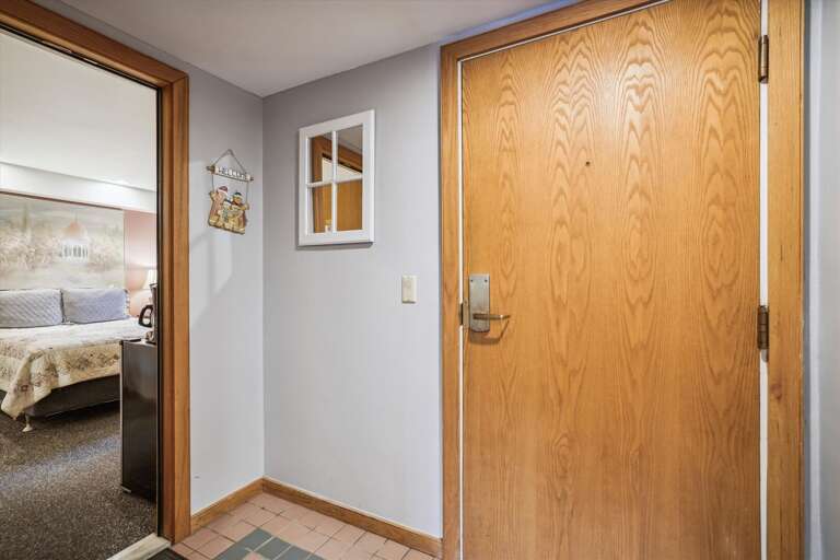 Entrance to small foyer and living spaces Entrance to small foyer and living spaces
